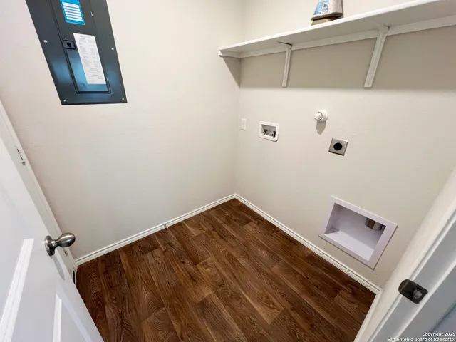 a view of kitchen with microwave and window