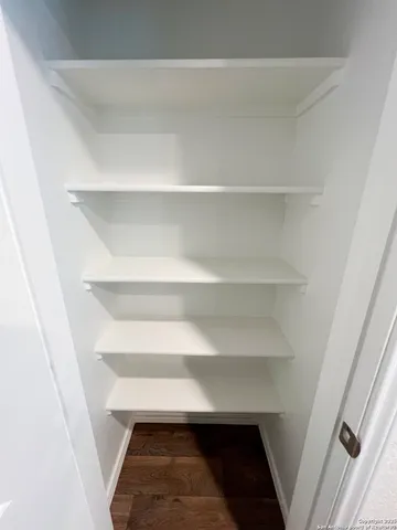 a kitchen that has a sink and a stove