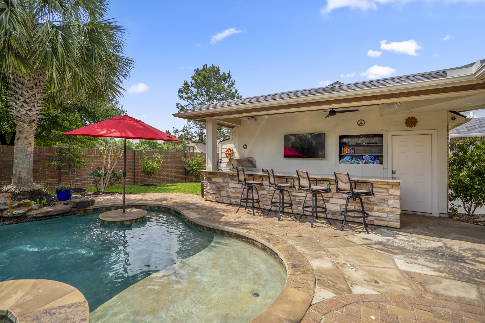 9707 Blue Cruls Way Spring, TX 77379 - Photo 45 of 50 swimming pool view with a seating space