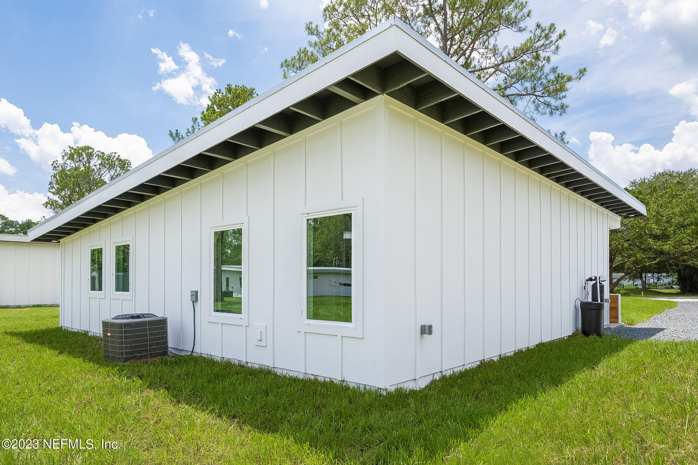 210 Yarbrough Road St. Augustine, FL 32095 - Photo 30 of 34 a backyard of a house with table and chairs