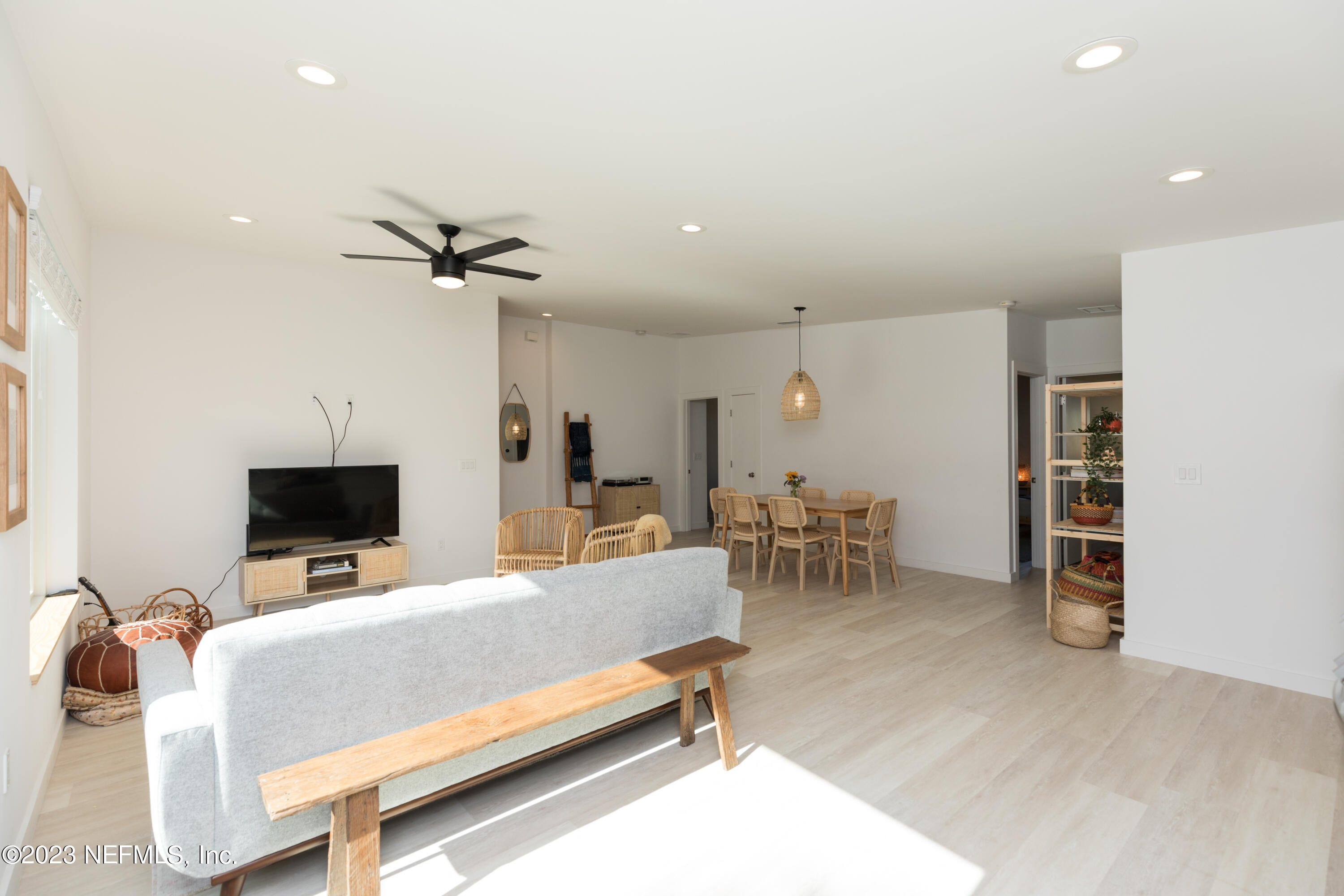 210 Yarbrough Road St. Augustine, FL 32095 - Photo 32 of 34 a living room with furniture and a flat screen tv