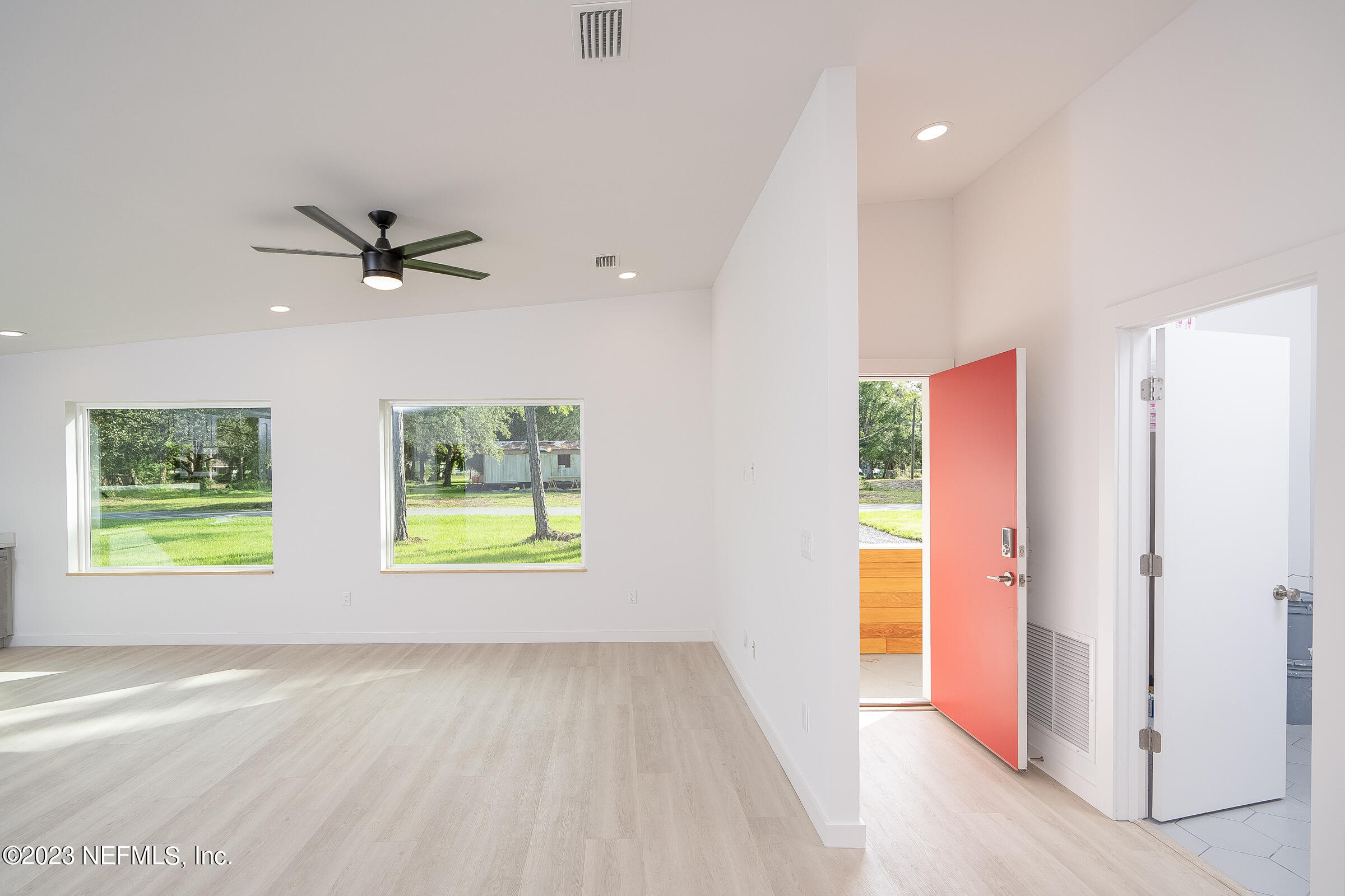 210 Yarbrough Road St. Augustine, FL 32095 - Photo 8 of 34 an empty room that has a window and a ceiling fan