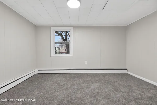 a view of a room with a window