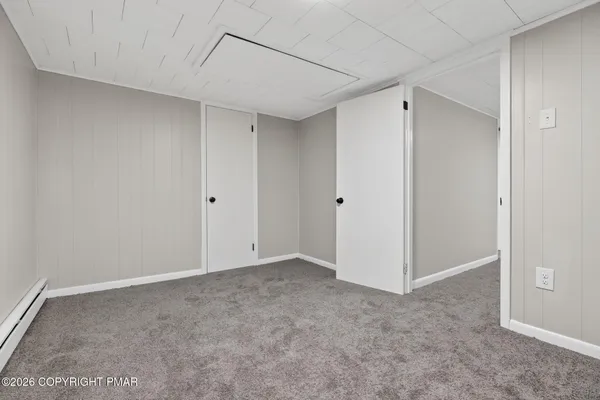 a utility room with cabinets