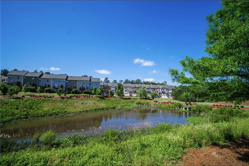1595 Ridgebrook Downs Mableton, GA 30126 - Photo 34 of 39 a view of a lake with a city
