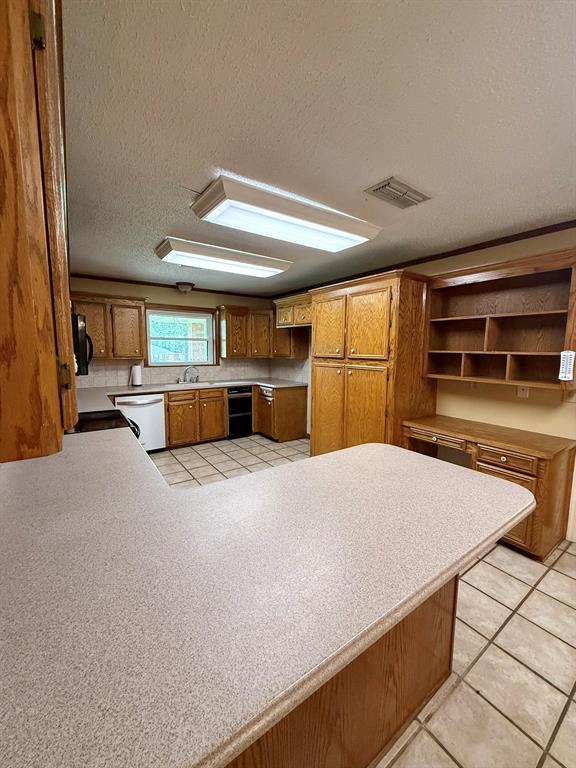 11535 Timber Ridge Drive Keithville, LA 71047 - Photo 4 of 39 a bed room with a bed and furniture