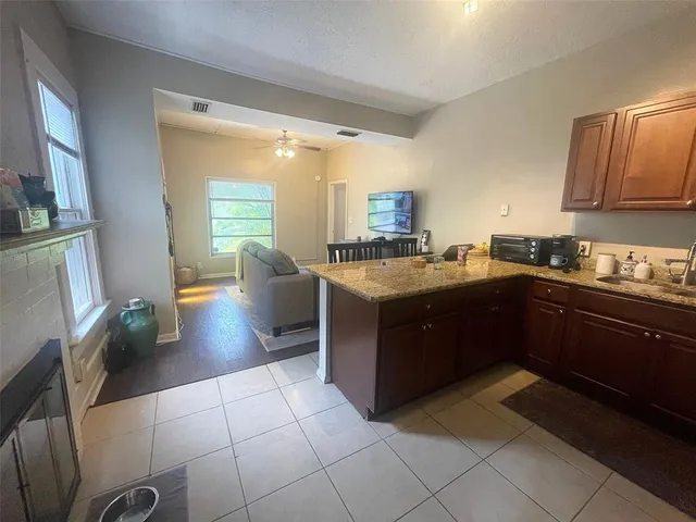 a kitchen with a cabinets and counter space