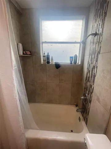 a bathroom with a bathtub