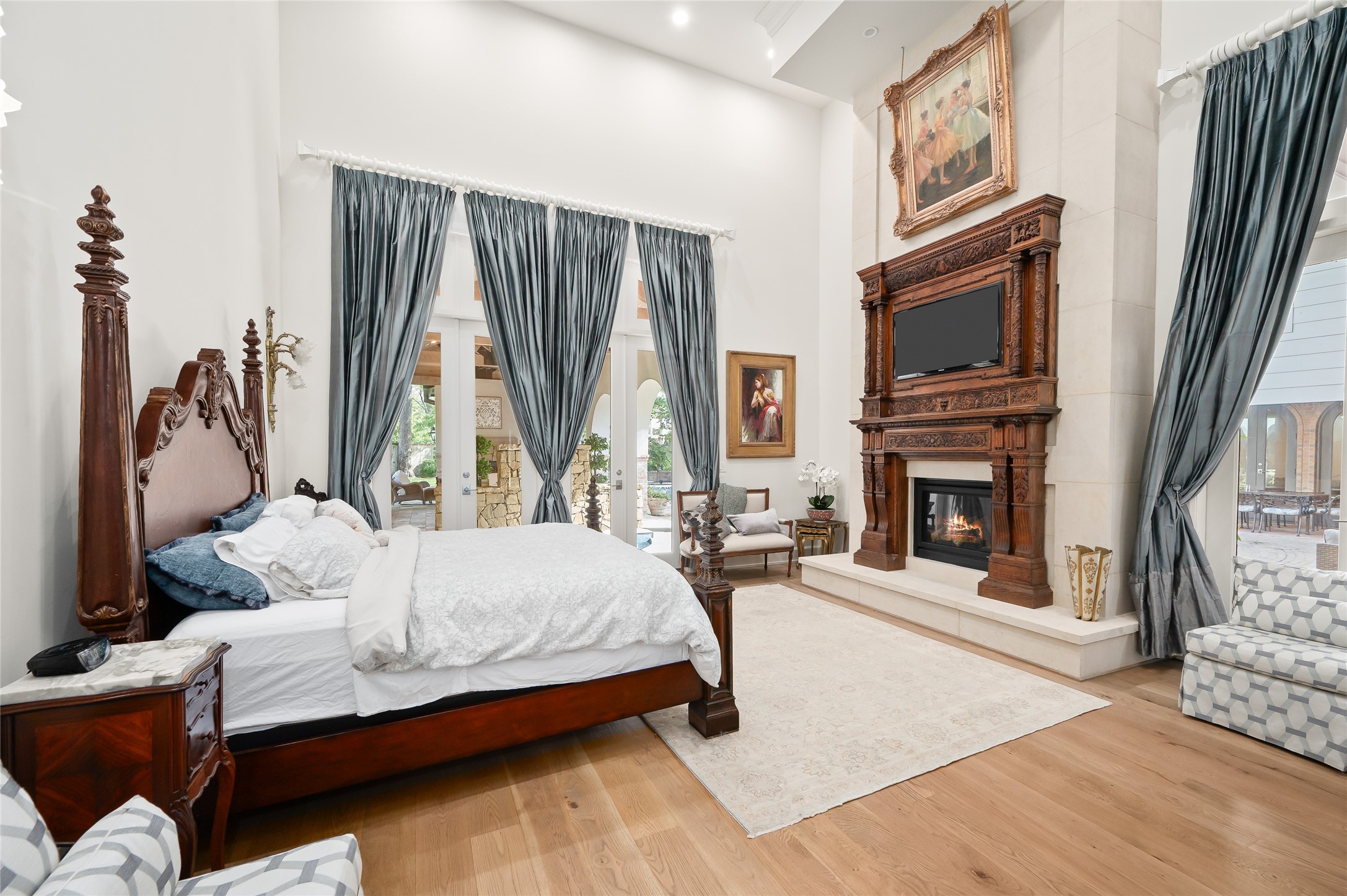 11518 Shadow Way Street Houston, TX 77024 - Photo 20 of 50 a bedroom with a bed and a fireplace