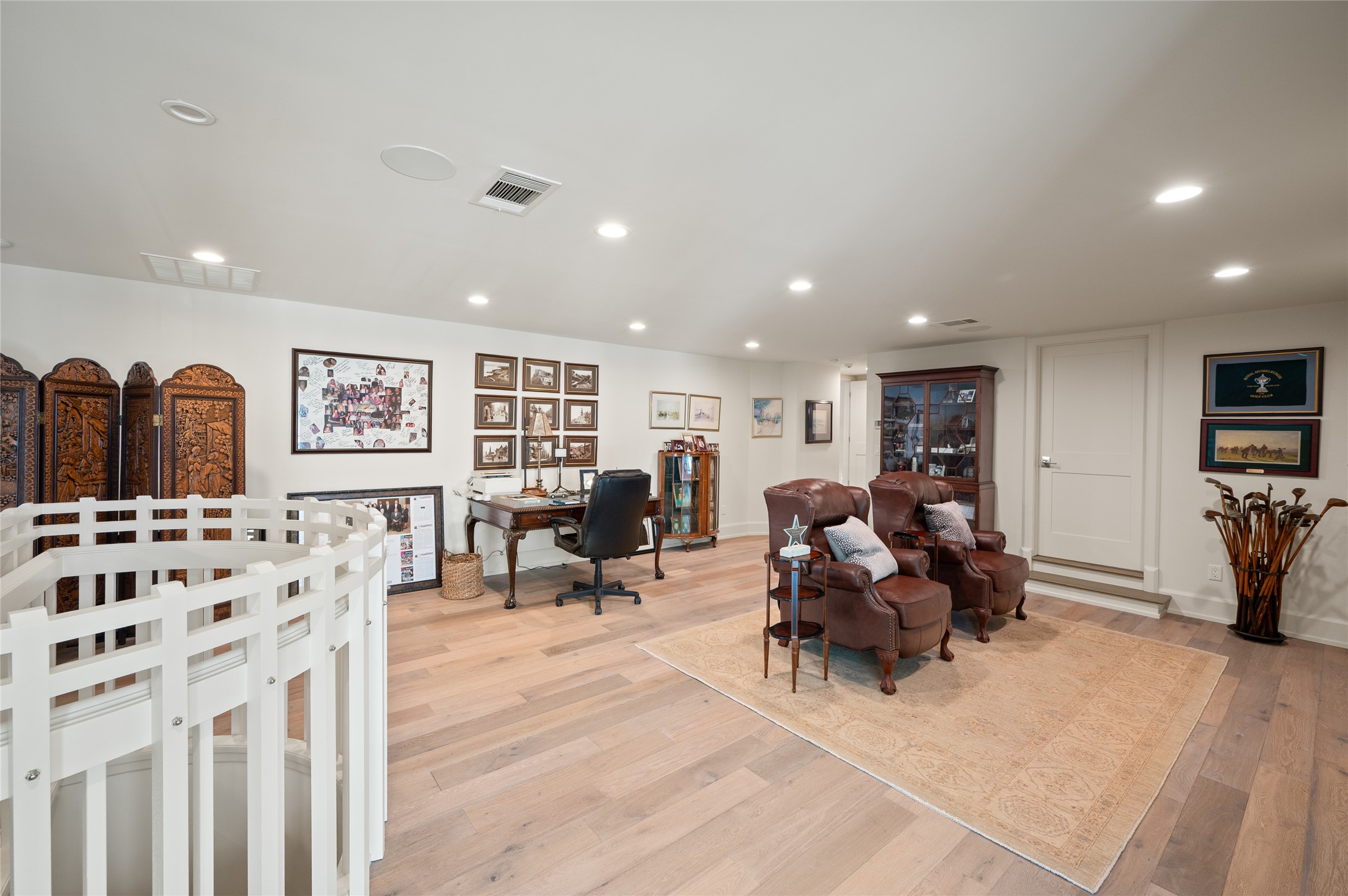 11518 Shadow Way Street Houston, TX 77024 - Photo 25 of 50 a living room with furniture a large window and a flat screen tv