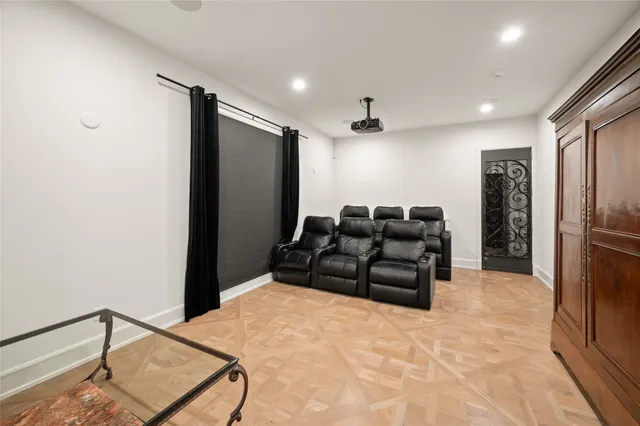 a room with a couch and a dresser