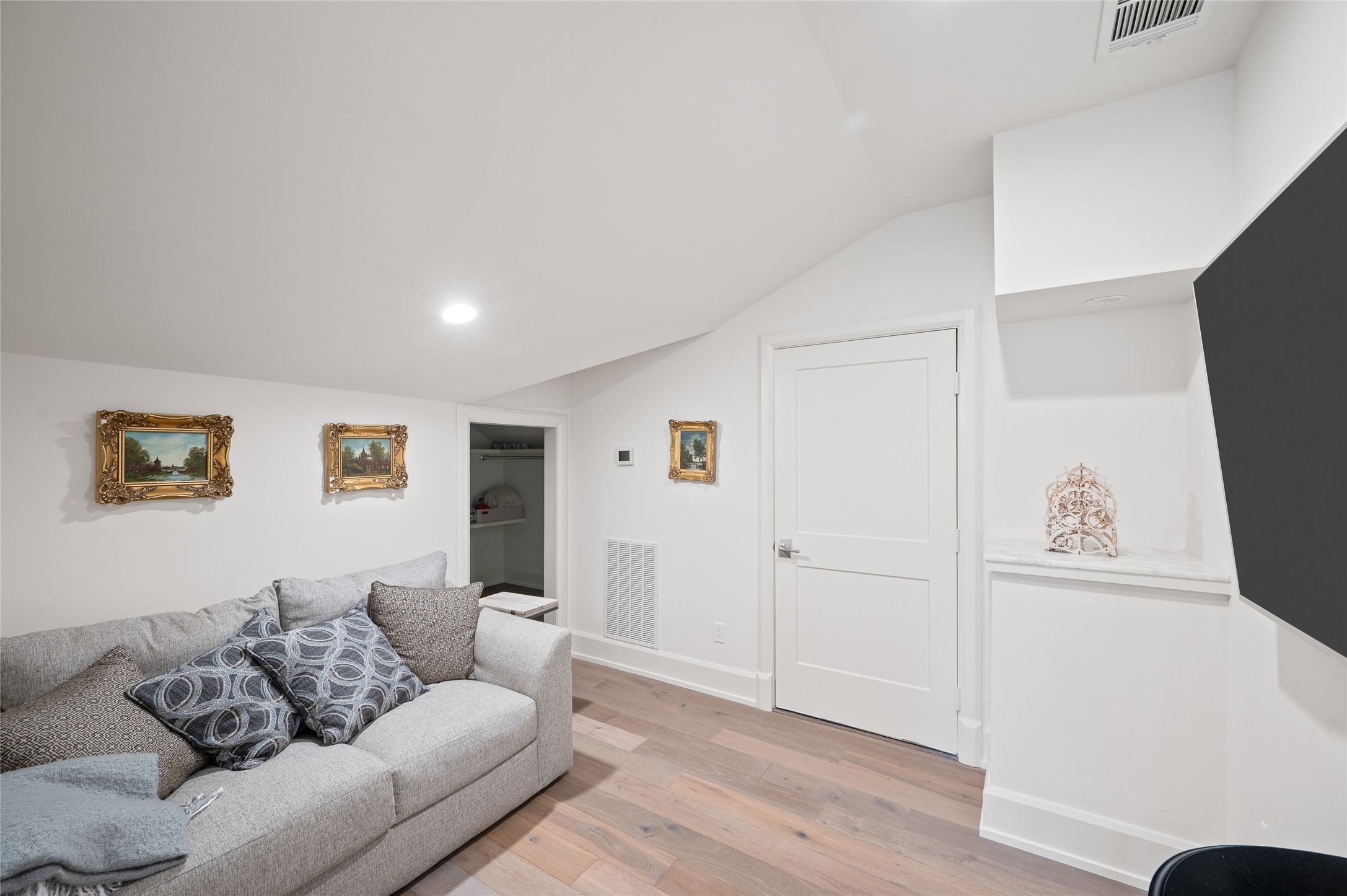 11518 Shadow Way Street Houston, TX 77024 - Photo 40 of 50 a living room with furniture and a wooden floor
