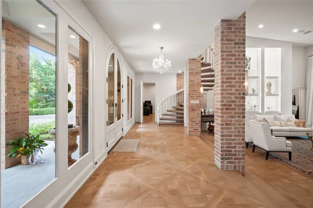 a view of livingroom with furniture and floor to ceiling window