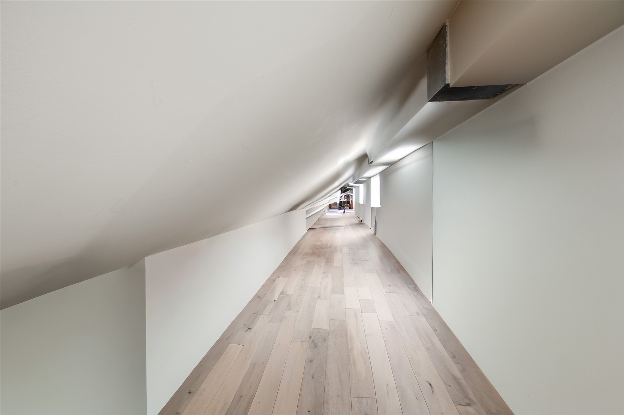 11518 Shadow Way Street Houston, TX 77024 - Photo 42 of 50 a view of a hallway with wooden floor