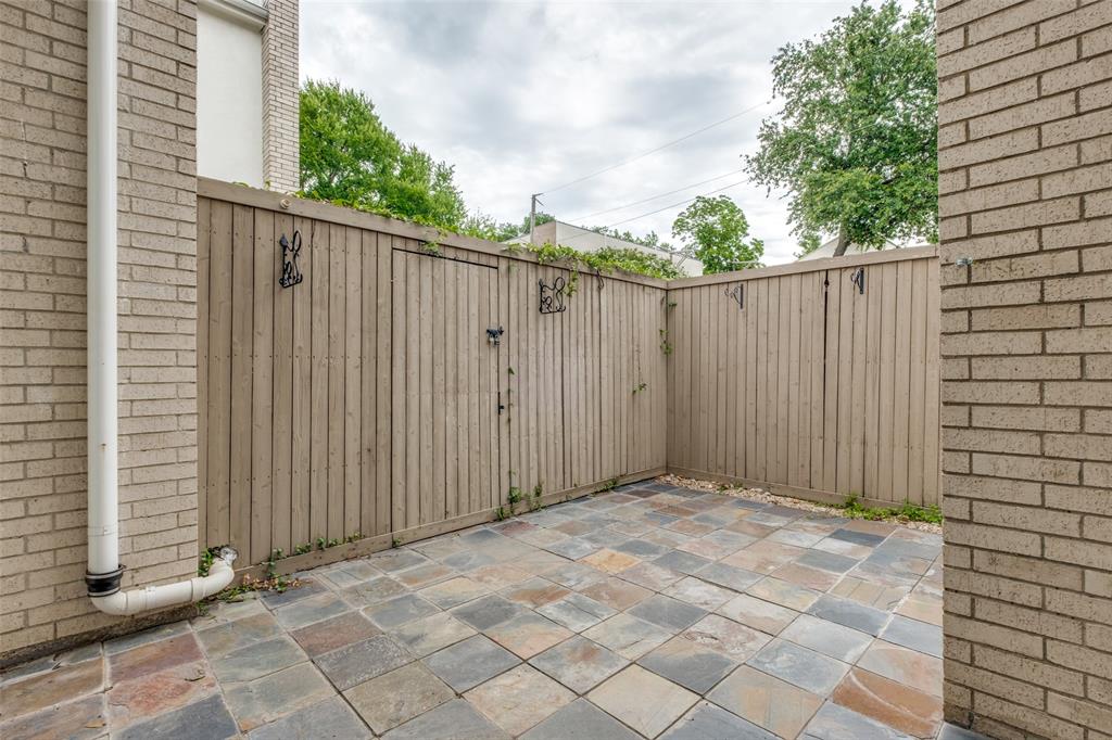 4302 Gilbert Avenue Dallas, TX 75219 - Photo 23 of 28 a view of backyard with wooden fence