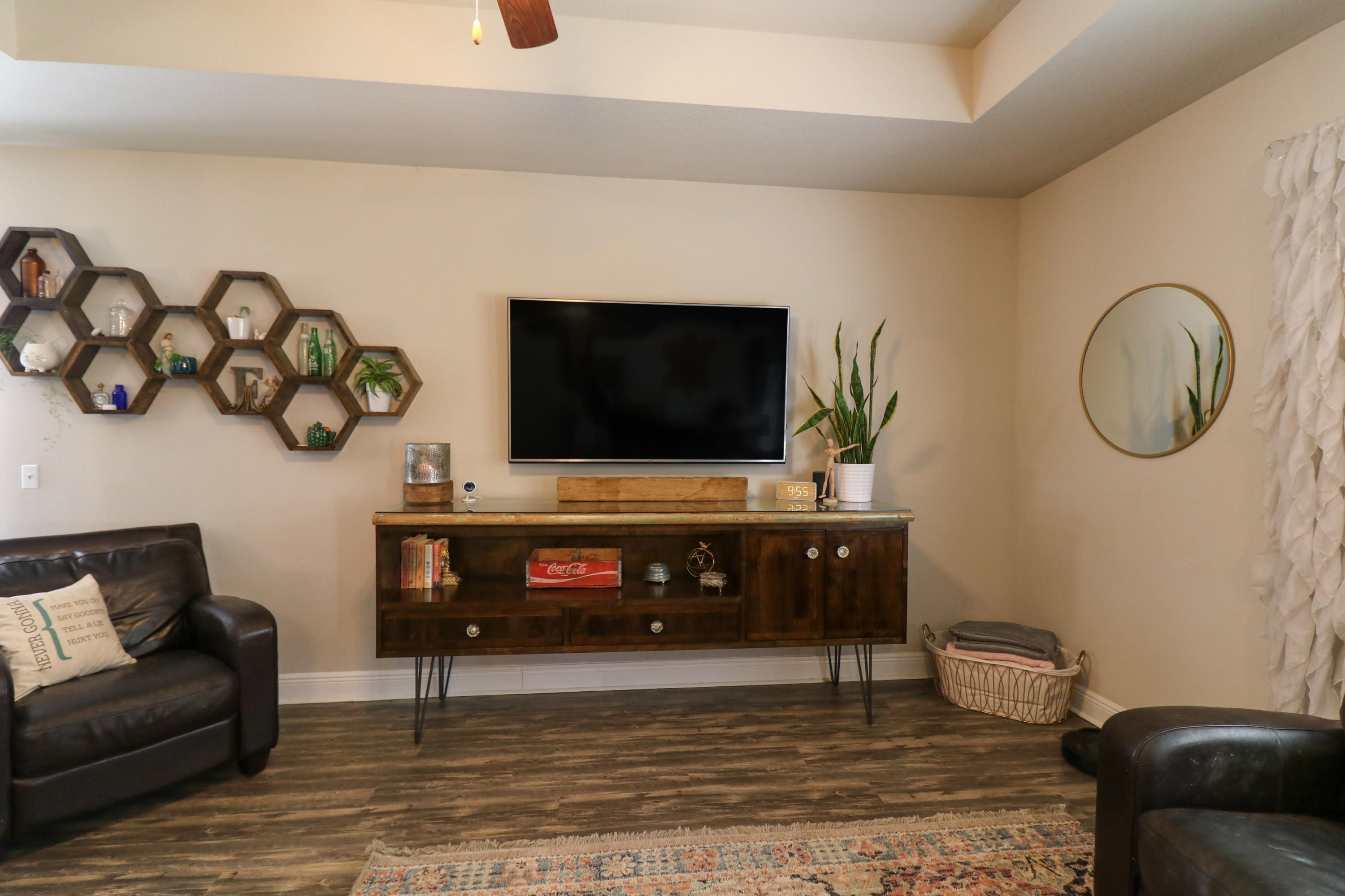 675 Red Fern Road Crestview, FL 32536 - Photo 12 of 35 a living room with furniture and a flat screen tv