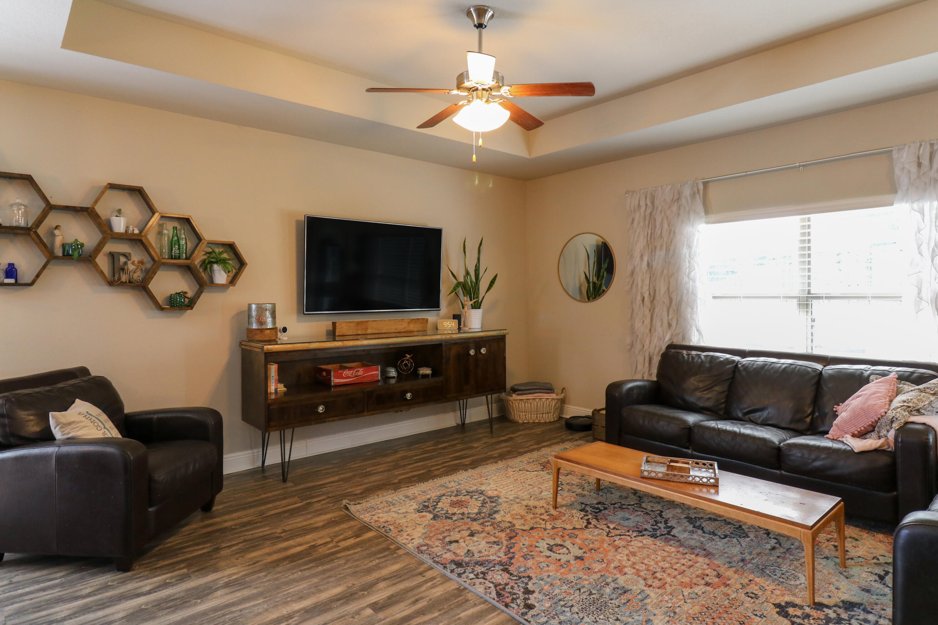 675 Red Fern Road Crestview, FL 32536 - Photo 13 of 35 a living room with furniture and a flat screen tv