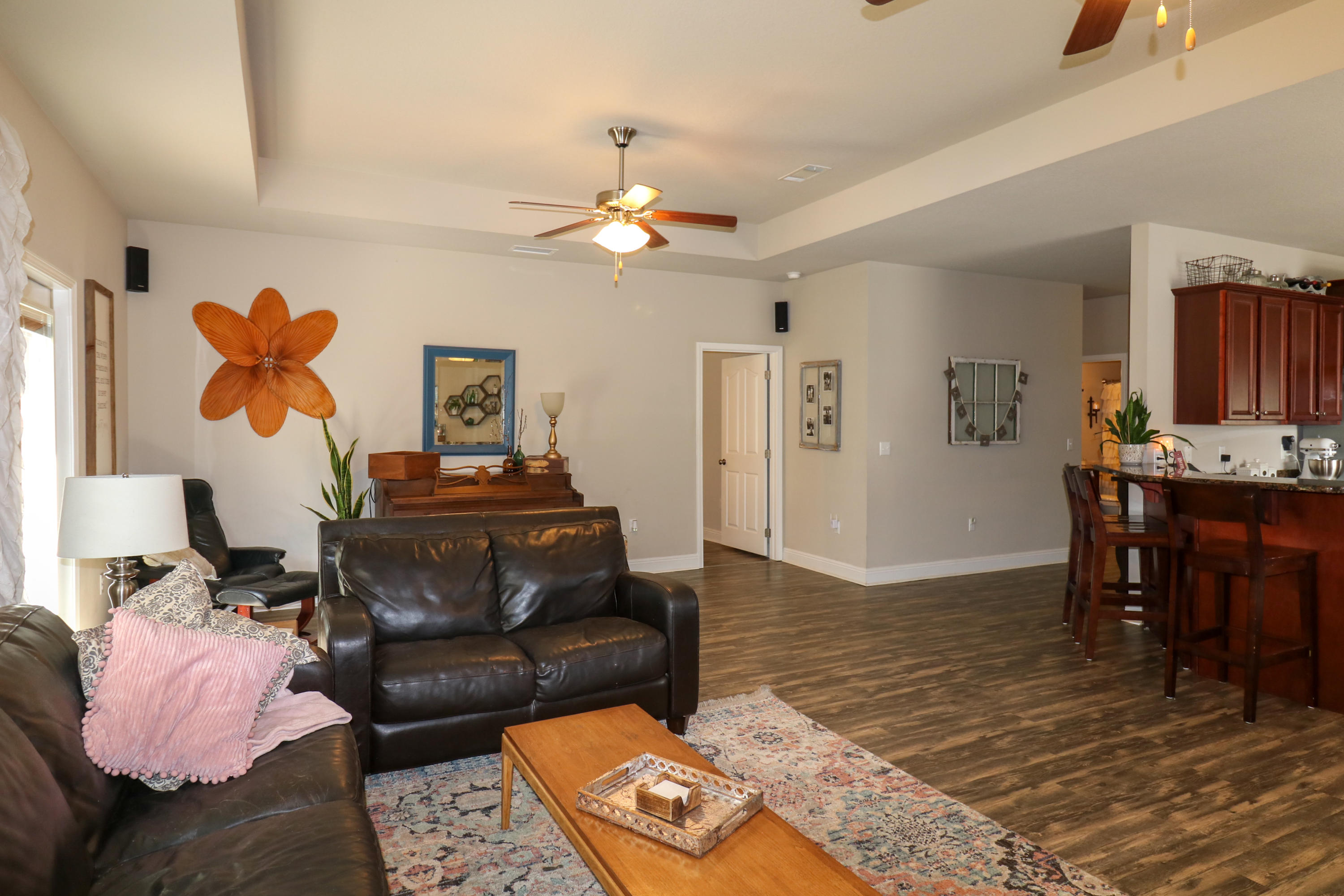 675 Red Fern Road Crestview, FL 32536 - Photo 14 of 35 a living room with furniture and a wooden floor