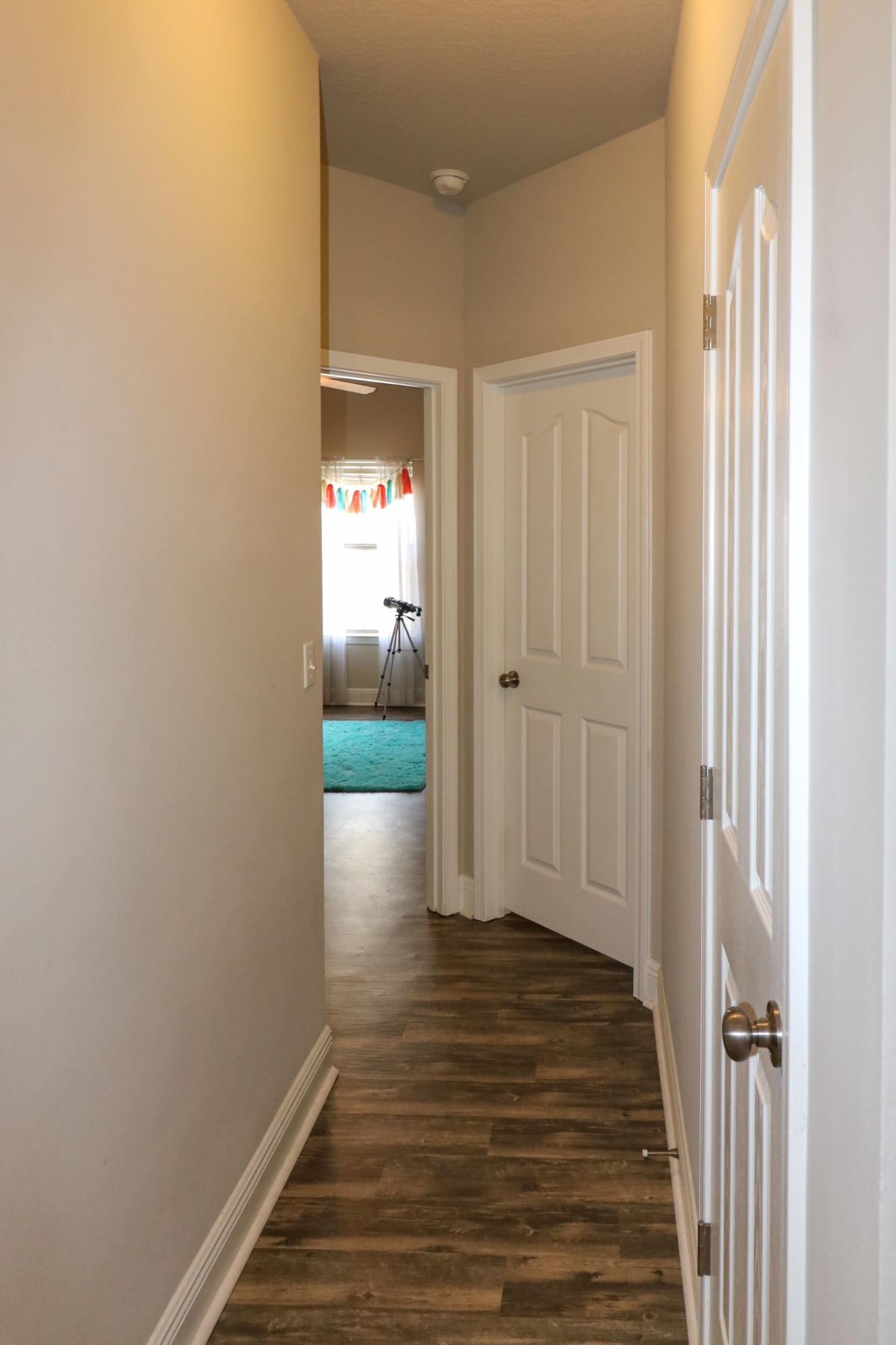 675 Red Fern Road Crestview, FL 32536 - Photo 19 of 35 a view of a room with wooden floor