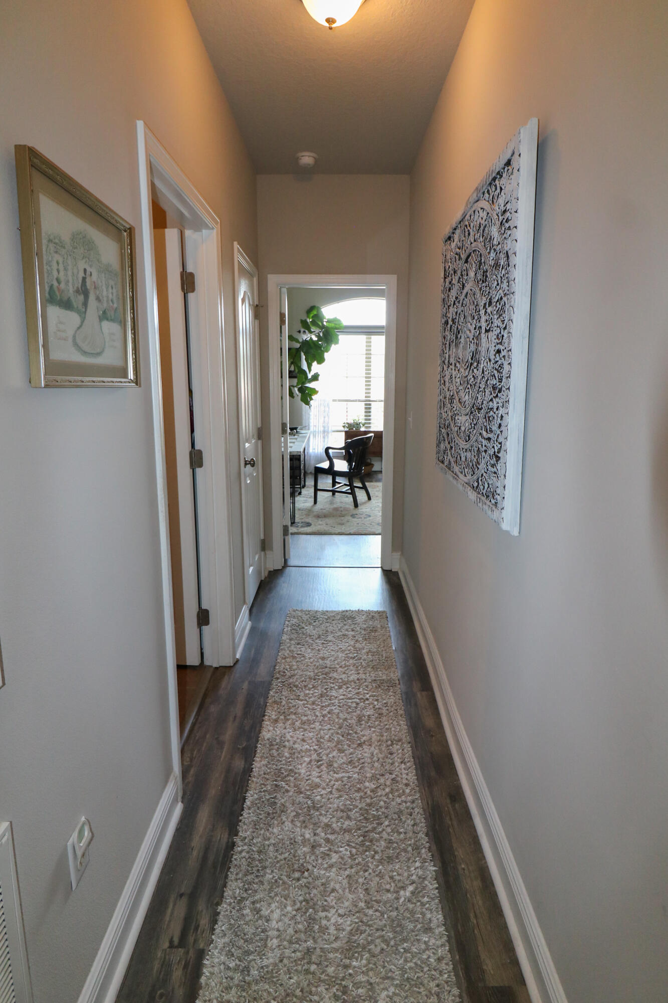 675 Red Fern Road Crestview, FL 32536 - Photo 26 of 35 a view of a hallway to filled with furniture