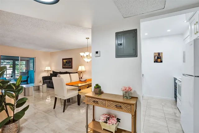 a living room with furniture and a gate