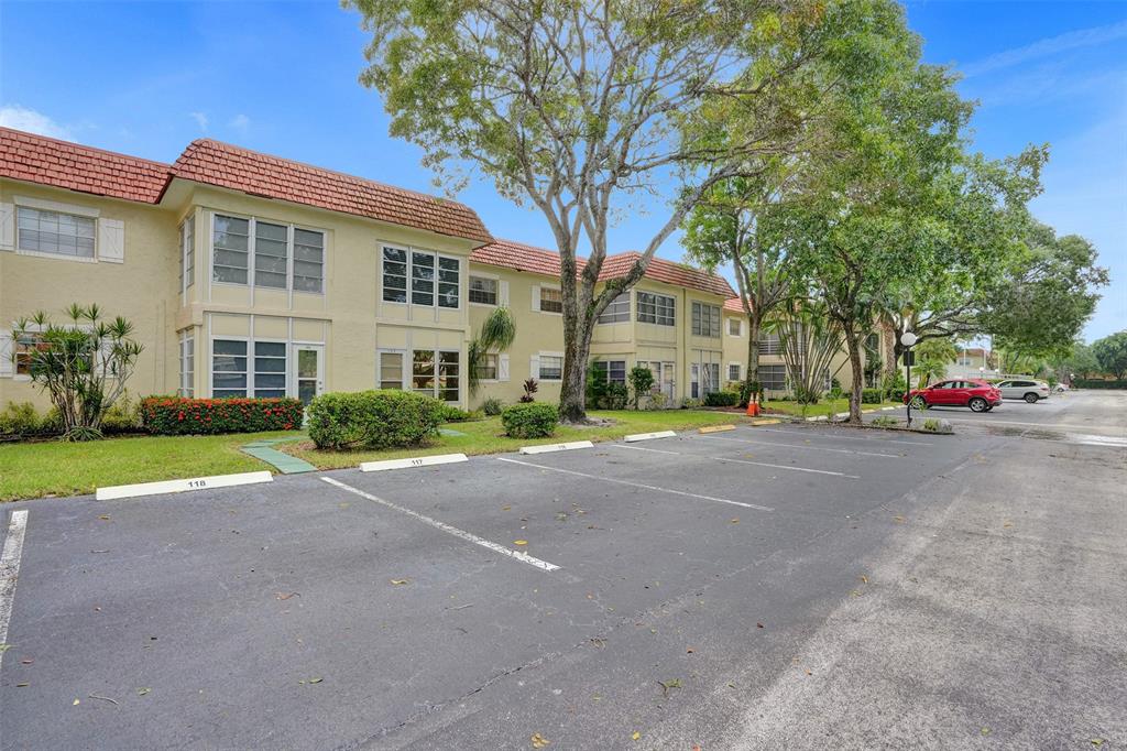 5681 Southwest 2nd Court, Unit 205 Margate, FL 33068 - Photo 32 of 37 a view of road with house