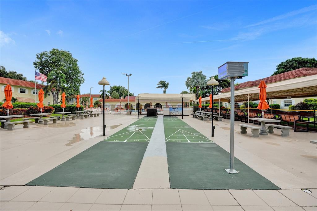 5681 Southwest 2nd Court, Unit 205 Margate, FL 33068 - Photo 36 of 37 a view of outdoor space with seating area