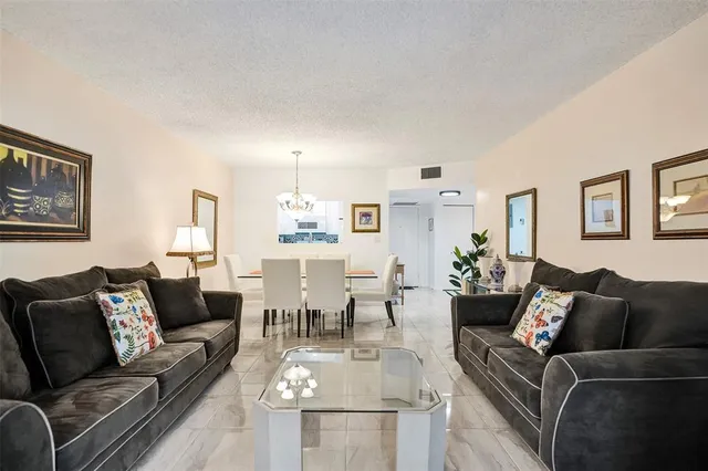 a living room with furniture and a couch