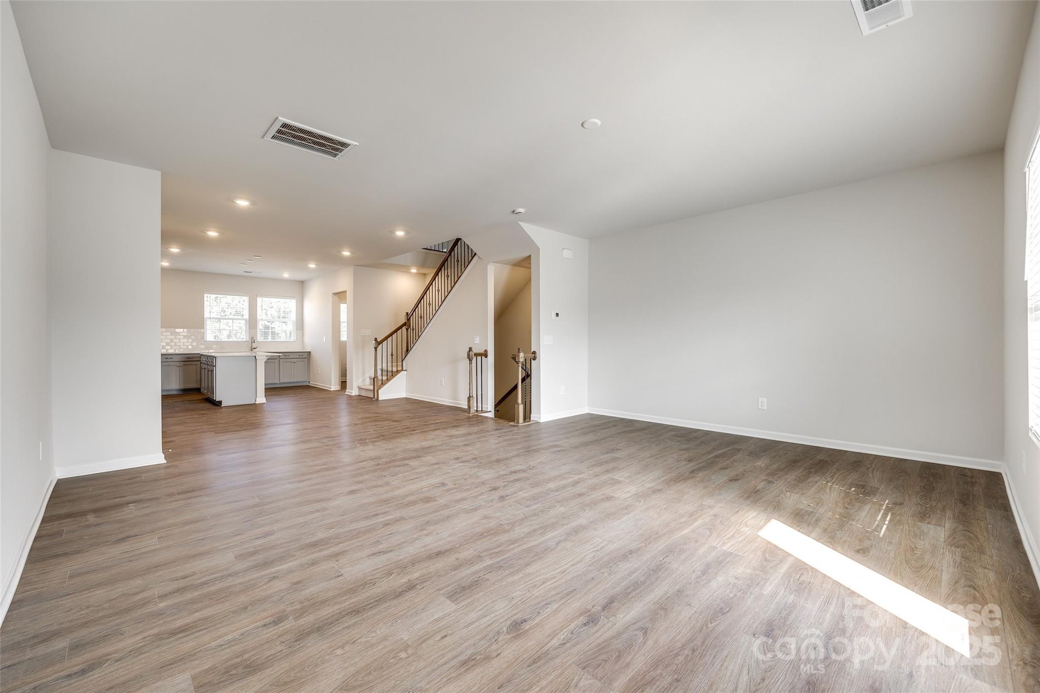 143 Morning Gap Parkway, Unit 14 Fort Mill, SC 29715 - Photo 11 of 30 a view of empty room with wooden floor