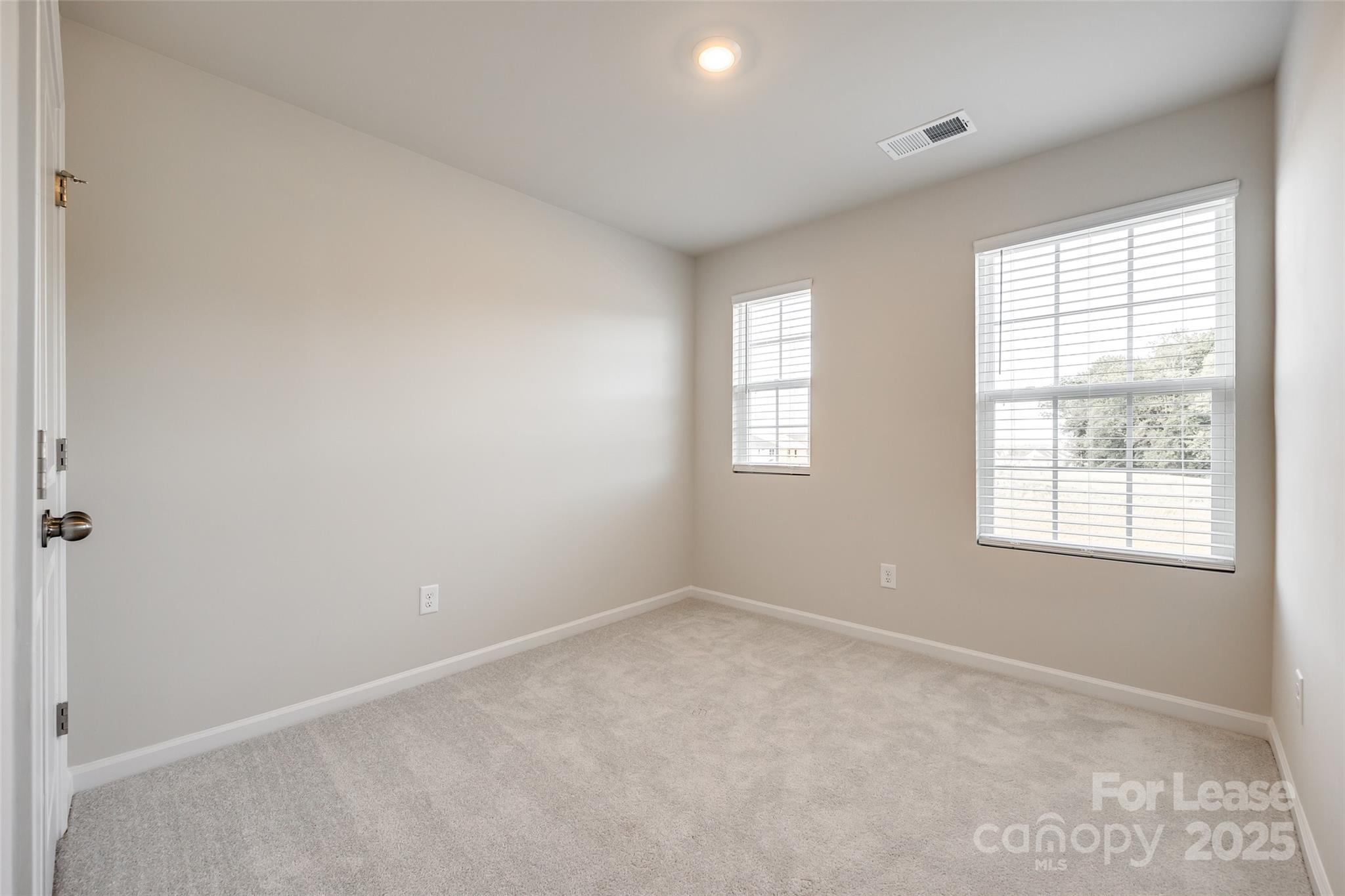 143 Morning Gap Parkway, Unit 14 Fort Mill, SC 29715 - Photo 19 of 30 an empty room with windows