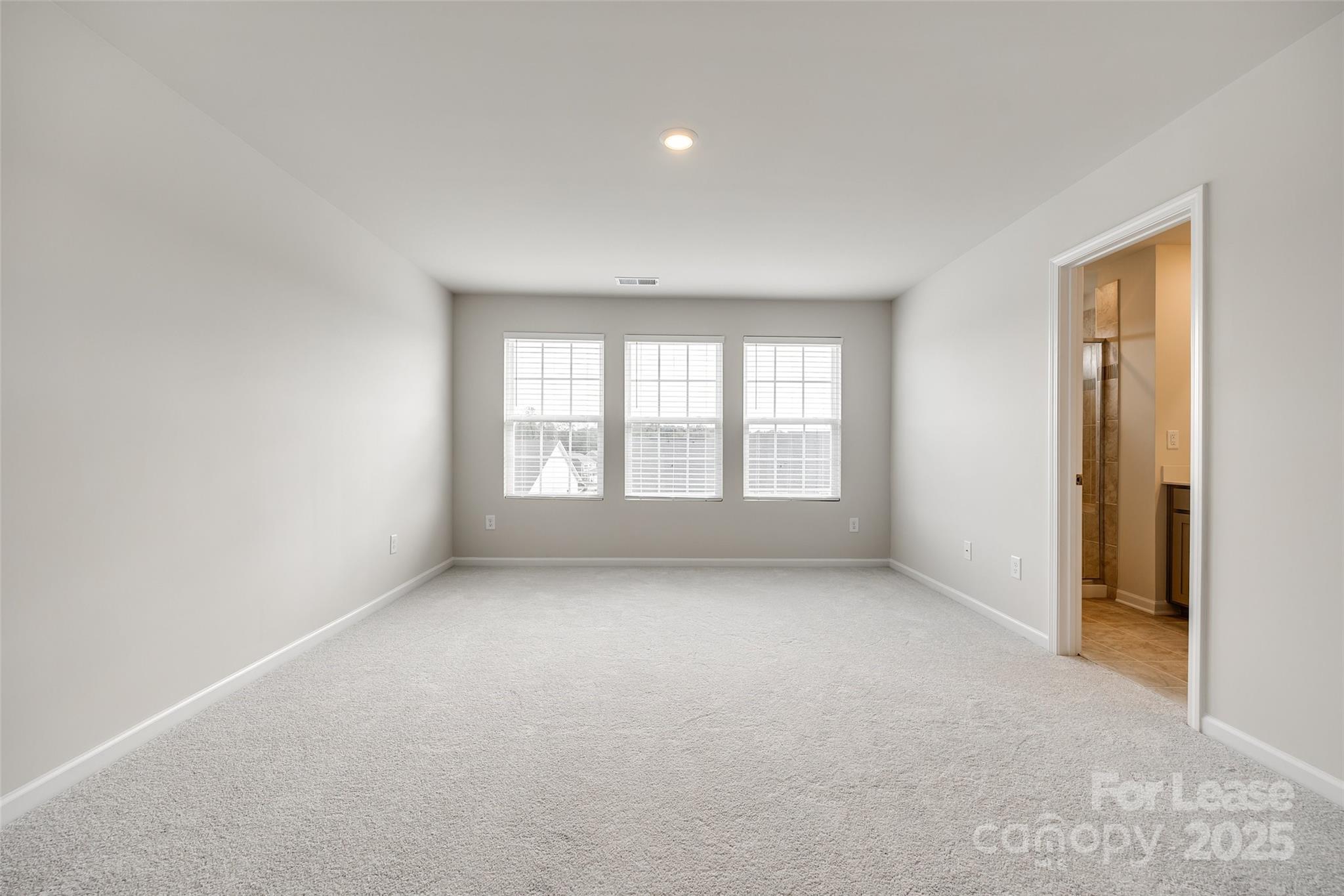 143 Morning Gap Parkway, Unit 14 Fort Mill, SC 29715 - Photo 22 of 30 an empty room with windows