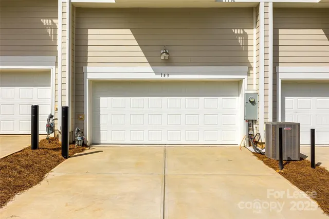 a view of a house with a garage