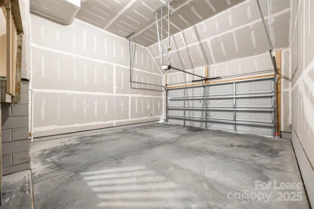 a view of a garage with racks on the wall