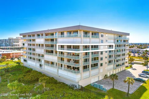 a view of building with balcony