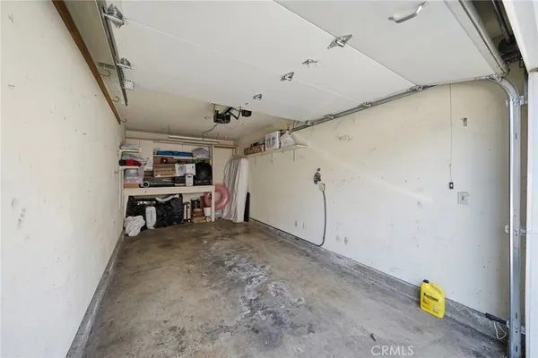 a view of swimming pool with outdoor seating and city view