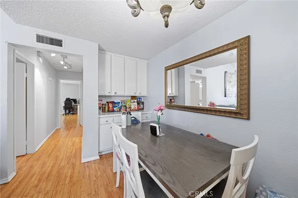 a kitchen with a sink cabinets and window