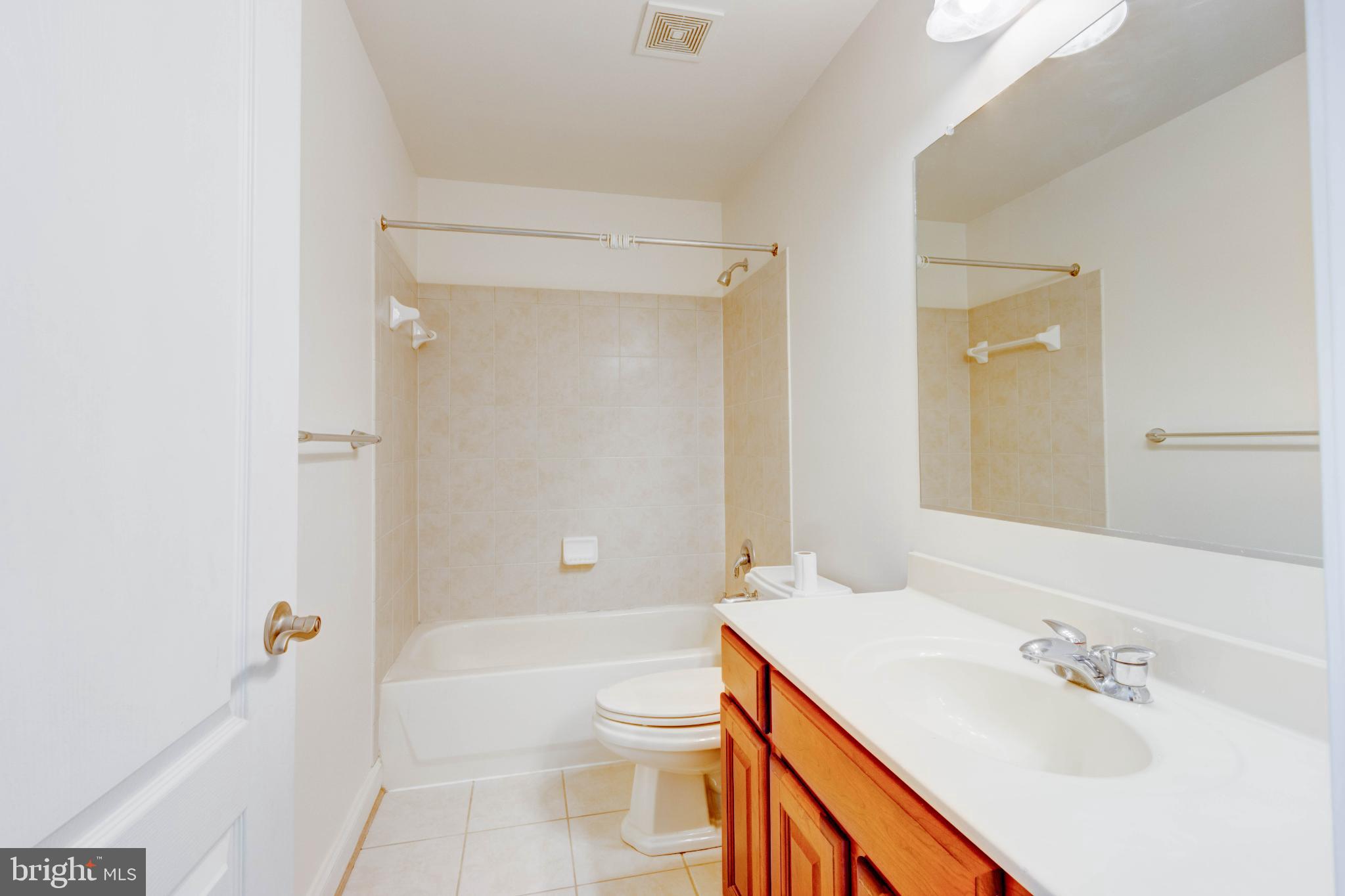 2629 Raptor Drive Odenton, MD 21113 - Photo 12 of 20 a bathroom with a sink a toilet and shower