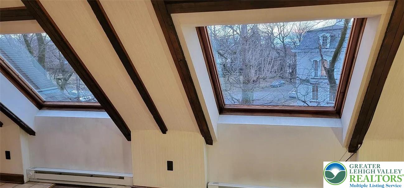 444 West 3rd Street, Unit 9 Bethlehem, PA 18015 - Photo 9 of 16 Two sloped skylights offer views of neighborhood trees and homes, infusing the space with natural light.