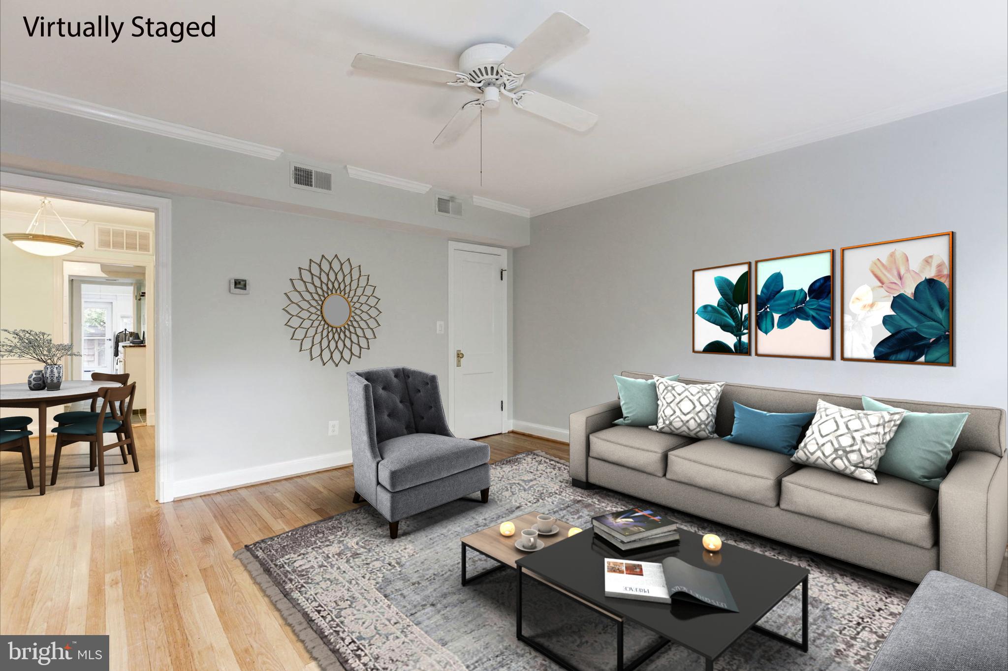 2335 40th Street Northwest, Unit 2 Washington, DC 20007 - Photo 5 of 19 Living Room with ceiling fan & coat closet