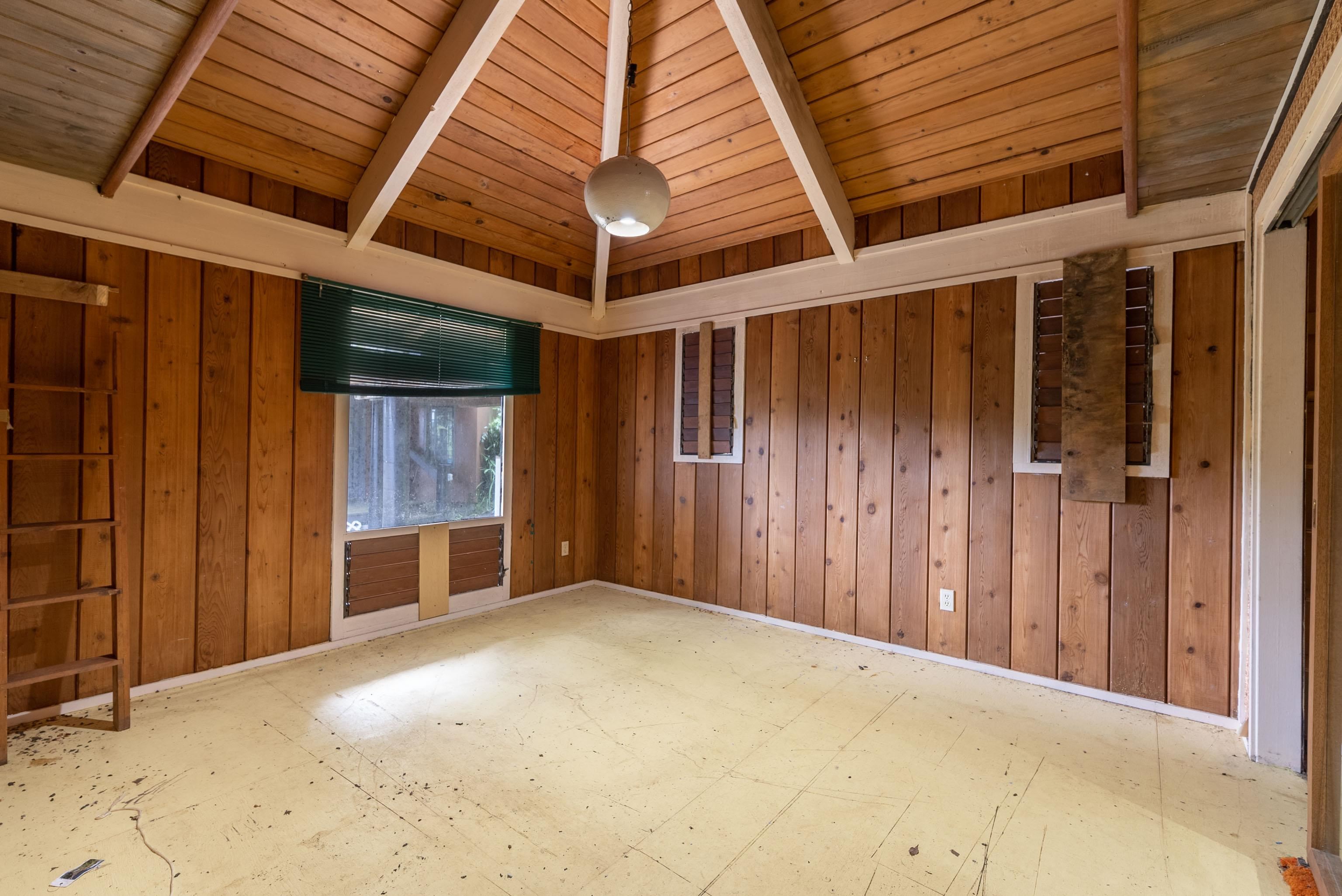 810 Nahiku Road Haiku, HI 96708 - Photo 16 of 50 an empty room with windows