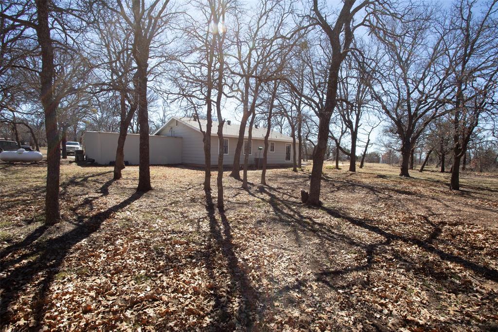 1250 Canyon Road Graham, TX 76450 - Photo 29 of 40 a view of a yard with trees