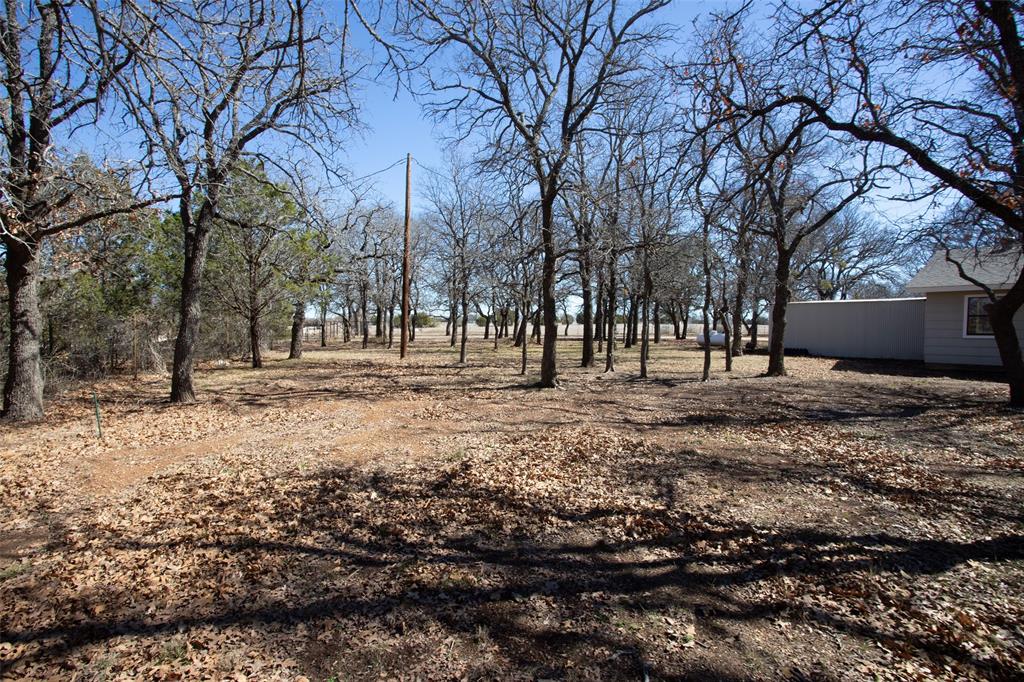 1250 Canyon Road Graham, TX 76450 - Photo 30 of 40 a view of road with covered trees
