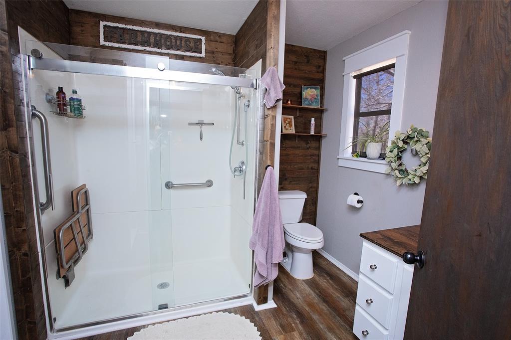 1250 Canyon Road Graham, TX 76450 - Photo 9 of 40 a bathroom with a shower and a toilet