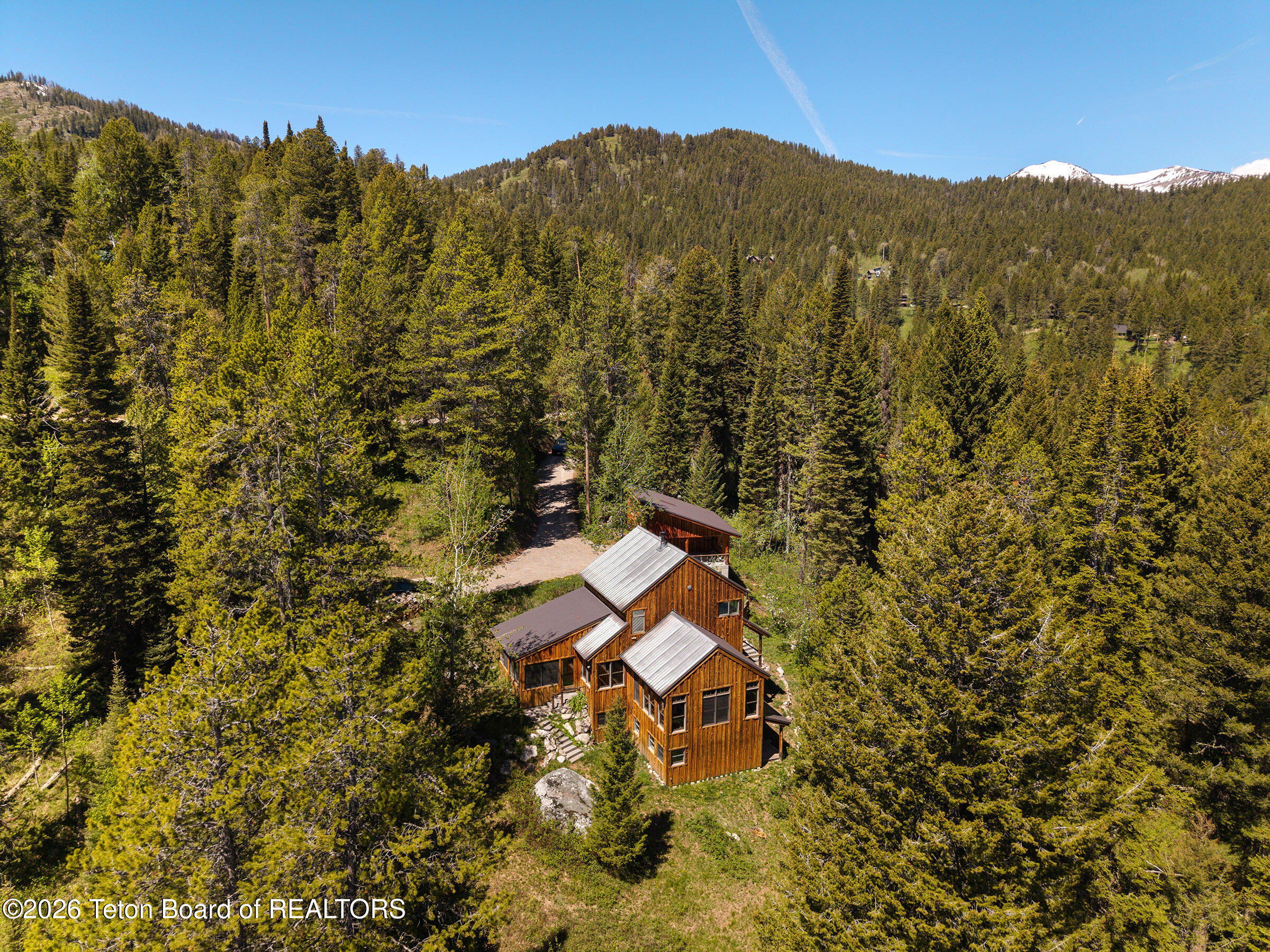 6640 Lupine Trail Wilson, WY 83014 - Photo 2 of 41 Drone East Facade_email