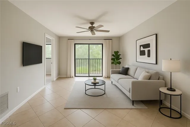 a living room with furniture a flat screen tv and a large window