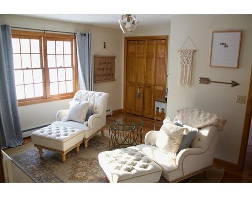 6 Manchaug Road Sutton, MA 01590 - Photo 13 of 23 a living room with furniture and a window
