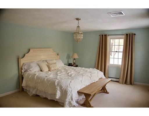 6 Manchaug Road Sutton, MA 01590 - Photo 17 of 23 a bedroom with a bed and a window