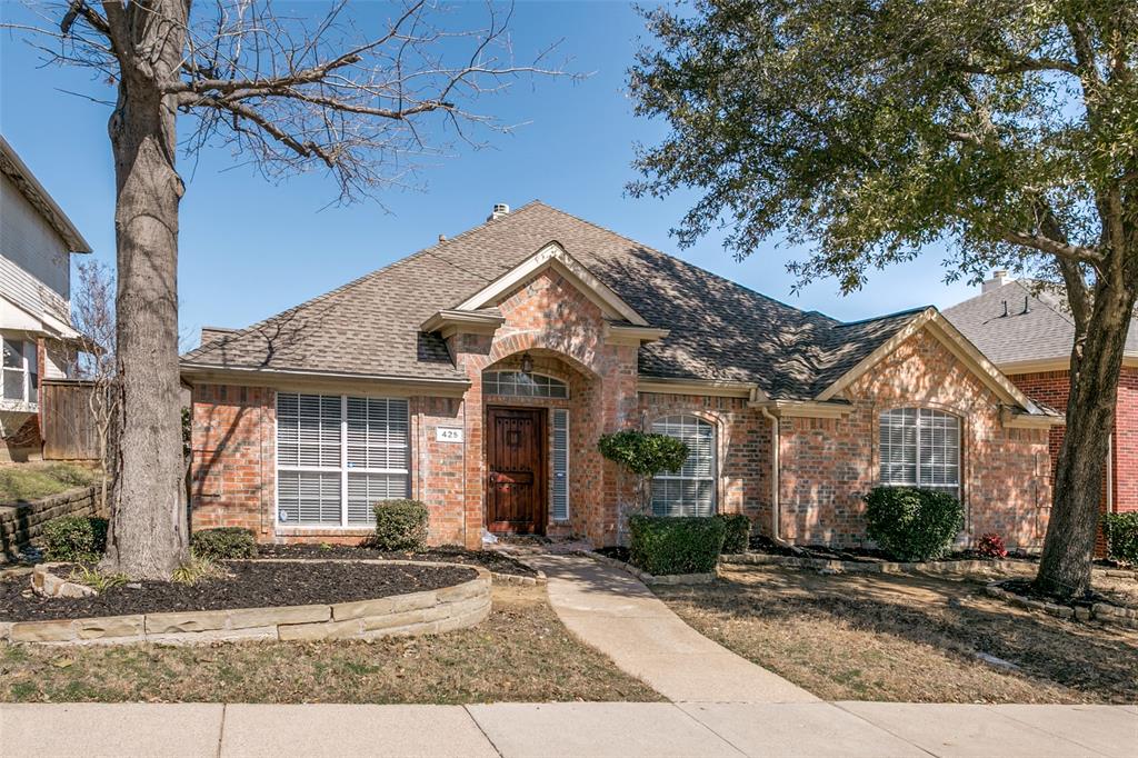 425 Ridge Meade Drive Lewisville, TX 75067 - Photo 1 of 1 a view of a house with a yard and large tree
