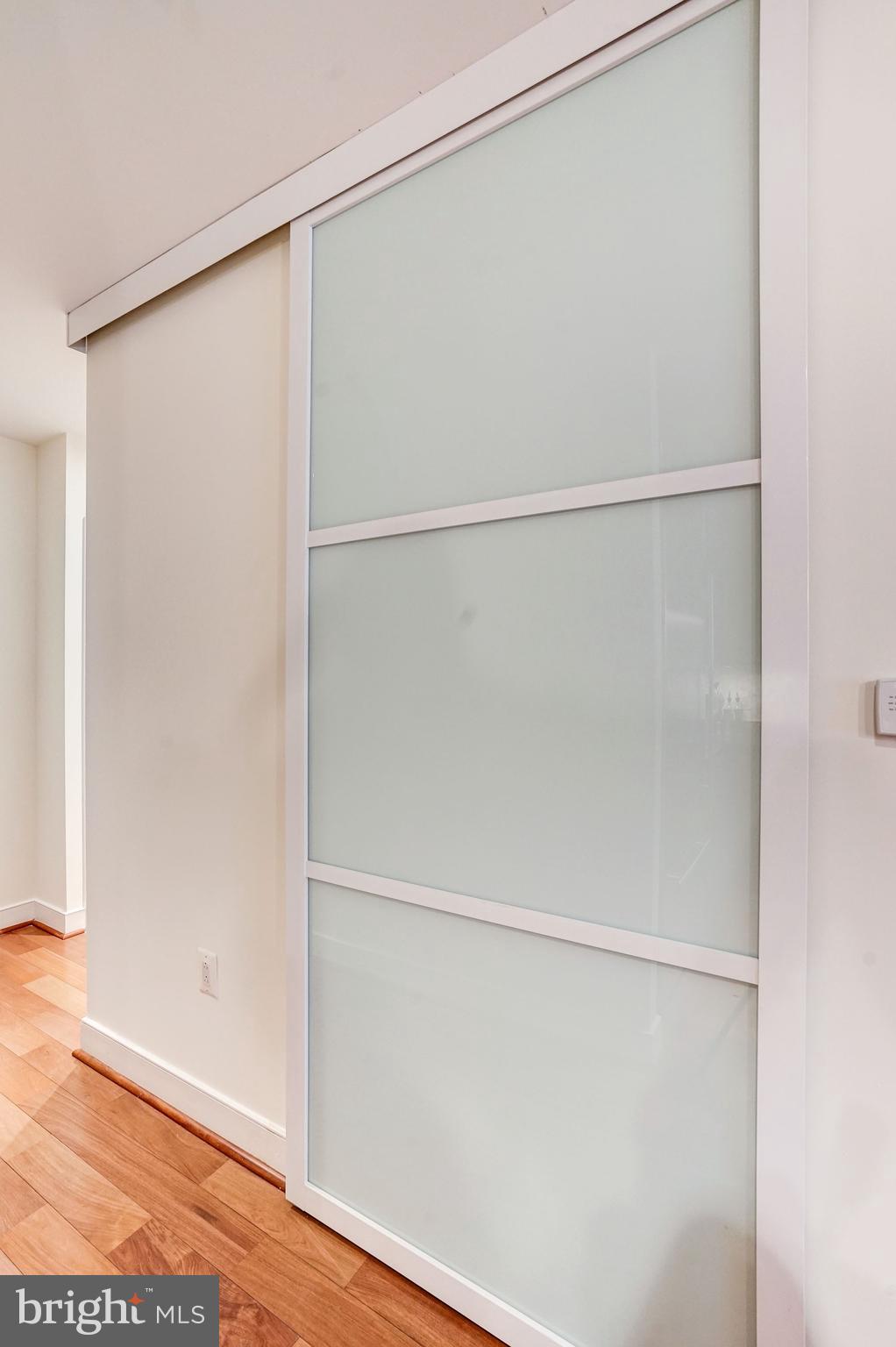 2425 L Street Northwest, Unit 434 Washington, DC 20037 - Photo 11 of 37 Add sliding door to elegantly obscure pantry