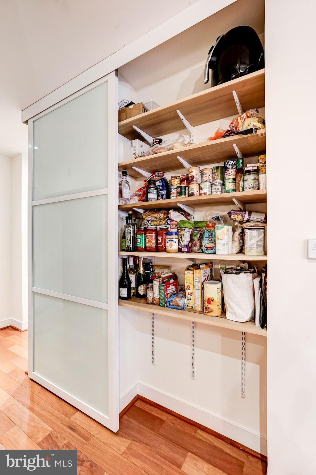 2425 L Street Northwest, Unit 434 Washington, DC 20037 - Photo 12 of 37 Add shelving for additional pantry storage.